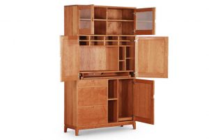 Cubbyhole Desk with multiple cubby compartments, doors on top, middle and bottom, middle keyboard pullout shelf, two file drawers on bottom